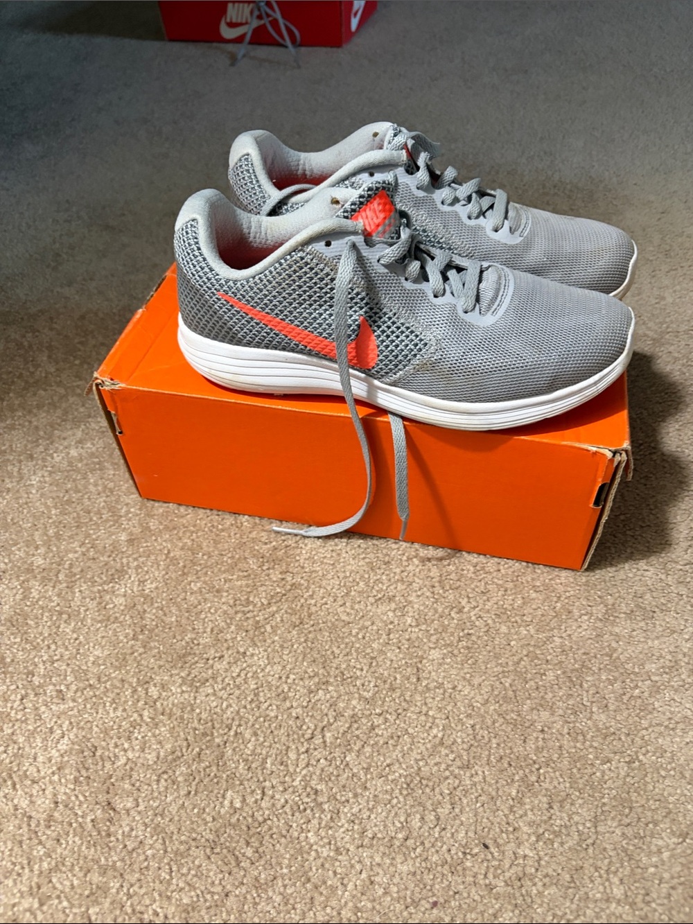 Nike Grey Mesh Running Sneakers with Orange Swoosh
